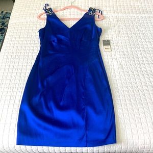New with tags special occasion dress. Beautiful royal blue color.